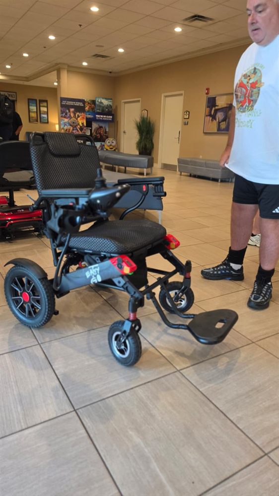 Three Easy Go Orlando mobility scooters at a Disney World resort